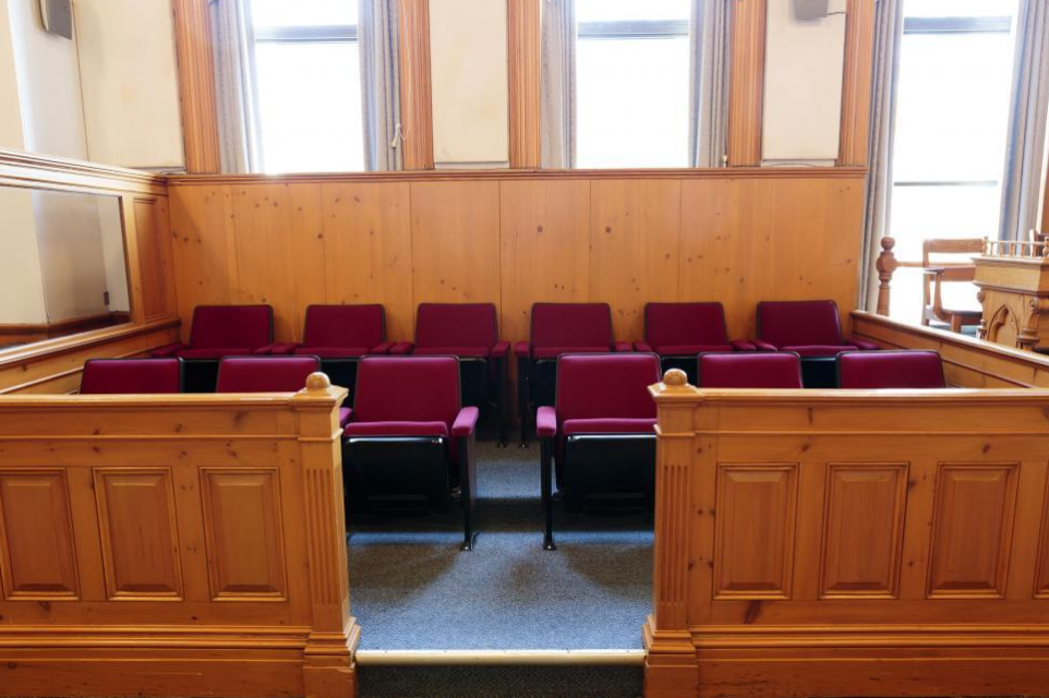 Empty jury seating box in court room